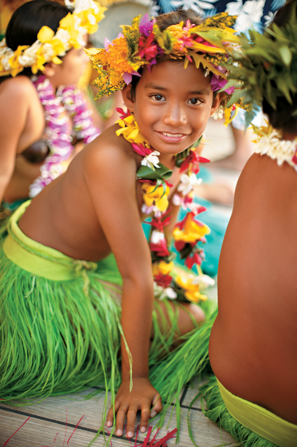 Enjoy local entertainment while relaxing on the pool deck.