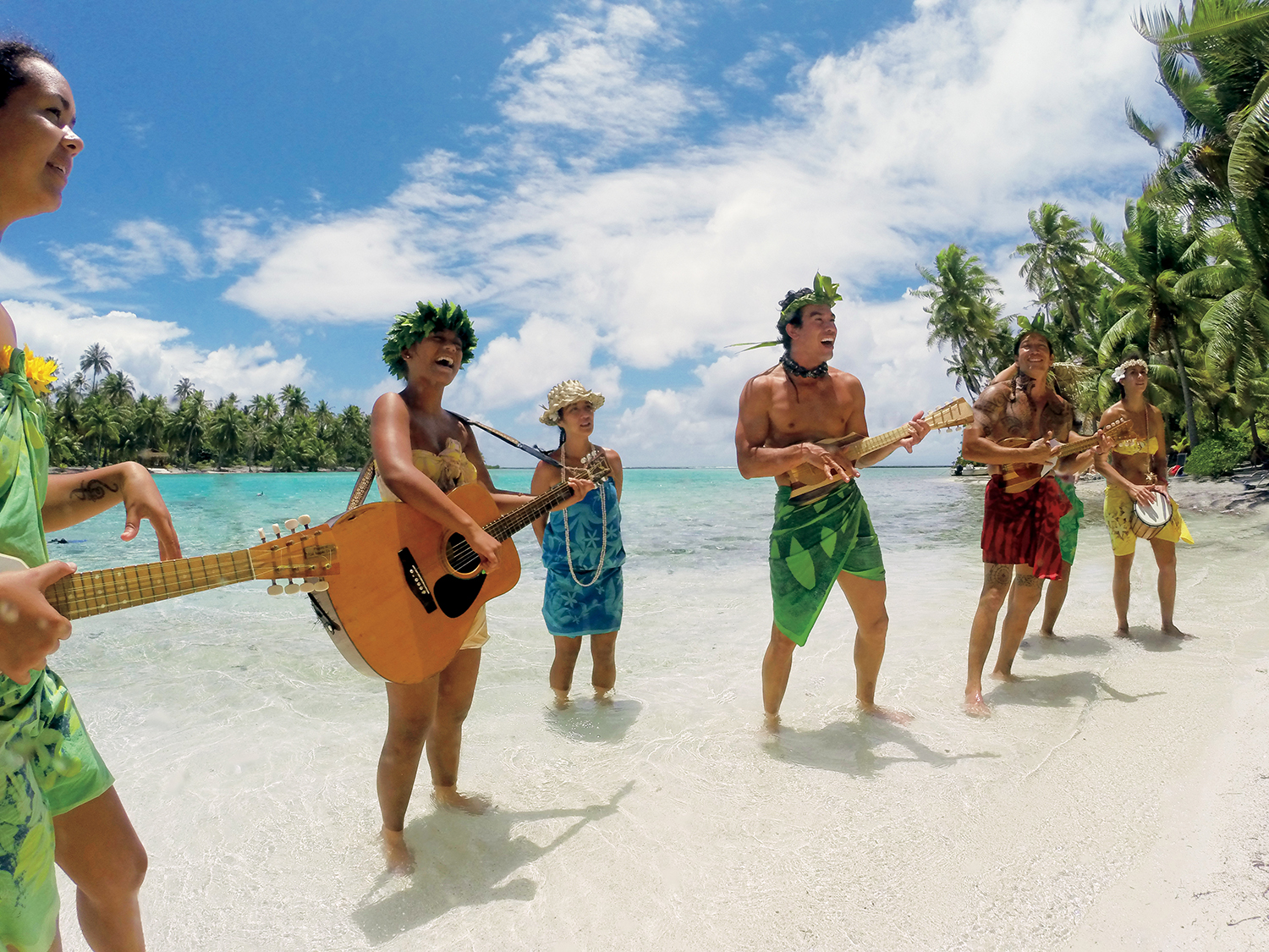 Enjoy entertainment by the Les Gauguines and Les Gauguins on our own private beach at Motu Mahana.
